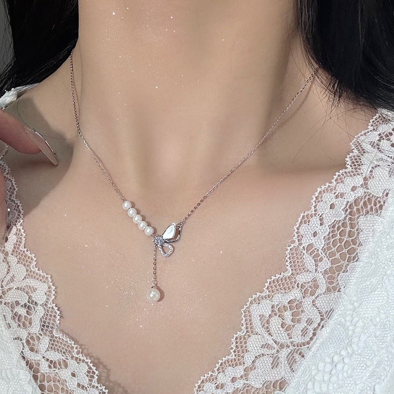 Marquise Perle: Sterling Silver Pearl Bow Necklace