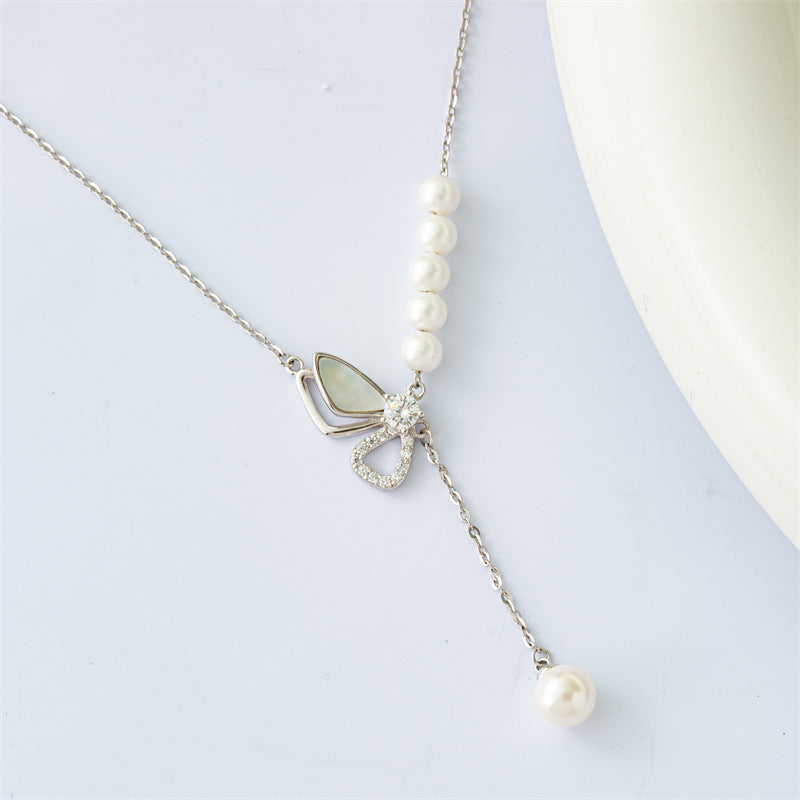 Marquise Perle: Sterling Silver Pearl Bow Necklace