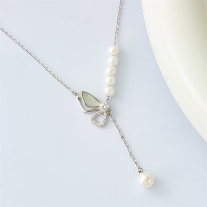 Marquise Perle: Sterling Silver Pearl Bow Necklace